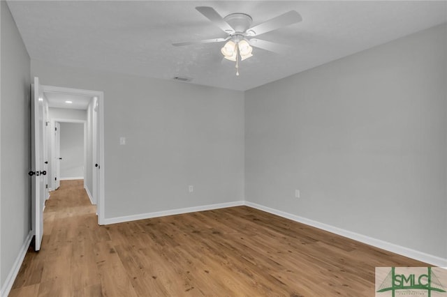 unfurnished bedroom with visible vents, baseboards, light wood-style floors, and a ceiling fan