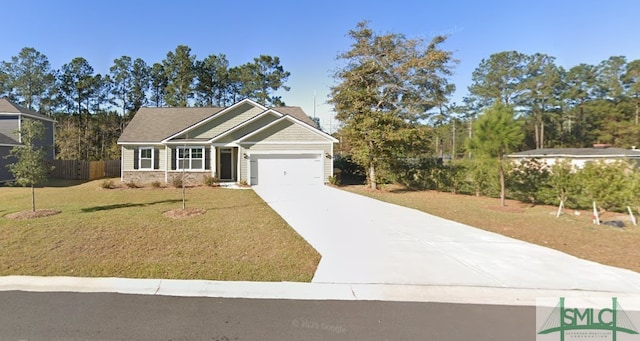 view of front of property with fence, a front lawn, concrete driveway, a garage, and stone siding