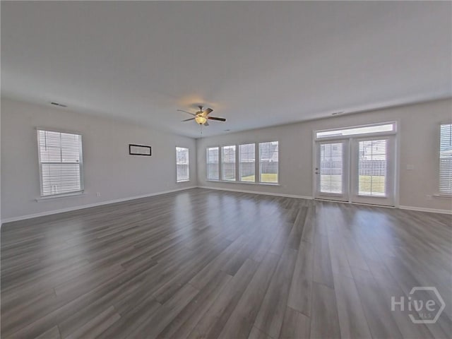 18 Allston Ln, Savannah, GA 31407 - unfurnished living room featuring baseboards, dark wood-type flooring, and ceiling fan