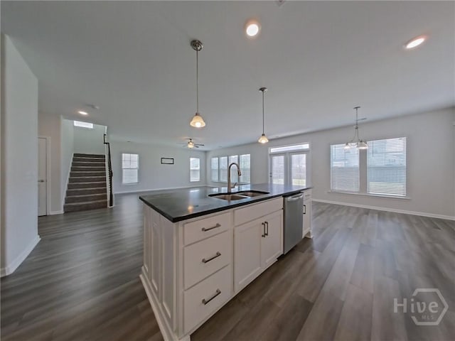 18 Allston Ln, Savannah, GA 31407 - kitchen featuring dishwasher, a sink, dark countertops, open floor plan, and dark wood-type flooring