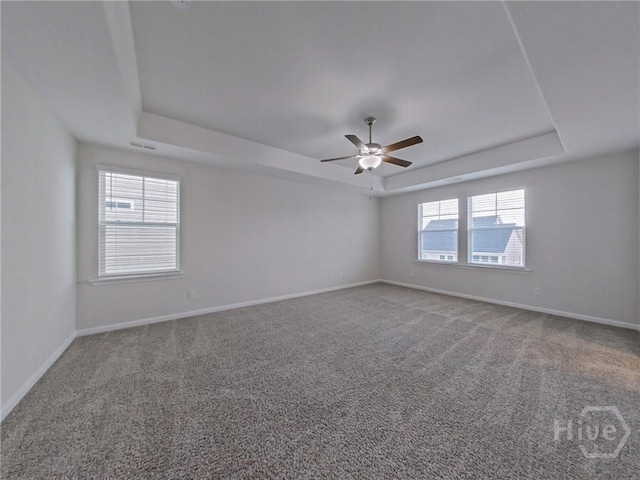 18 Allston Ln, Savannah, GA 31407 - carpeted spare room featuring a tray ceiling, a ceiling fan, and baseboards
