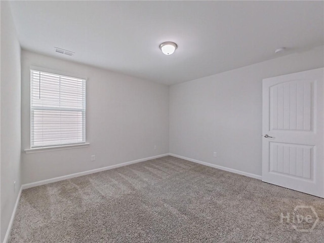 18 Allston Ln, Savannah, GA 31407 - spare room featuring carpet, baseboards, and healthy amount of natural light