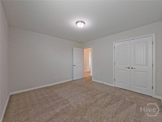 18 Allston Ln, Savannah, GA 31407 - unfurnished bedroom featuring carpet floors, baseboards, and a closet