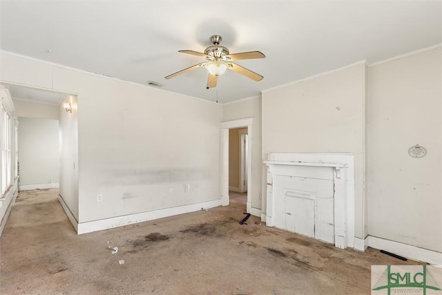 interior space with baseboards, a ceiling fan, visible vents, and ornamental molding