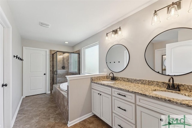 full bath with double vanity, a shower stall, a garden tub, and a sink