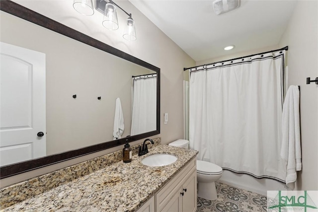 full bathroom with tile patterned flooring, shower / bath combo with shower curtain, toilet, and vanity