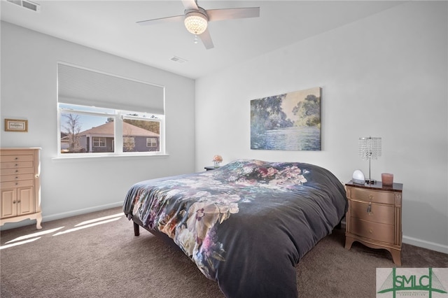 carpeted bedroom featuring visible vents, ceiling fan, and baseboards