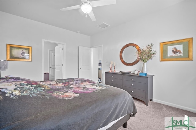 bedroom featuring a ceiling fan, visible vents, light colored carpet, and baseboards