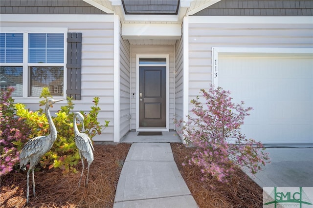 entrance to property with a garage