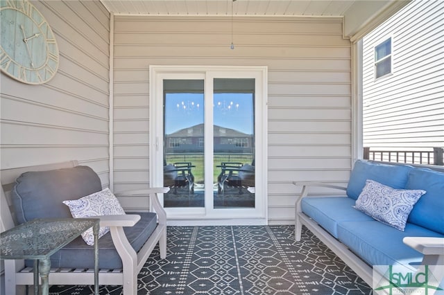 exterior space featuring an outdoor hangout area and a patio