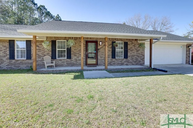 ranch-style home with roof with shingles, an attached garage, covered porch, a front lawn, and brick siding