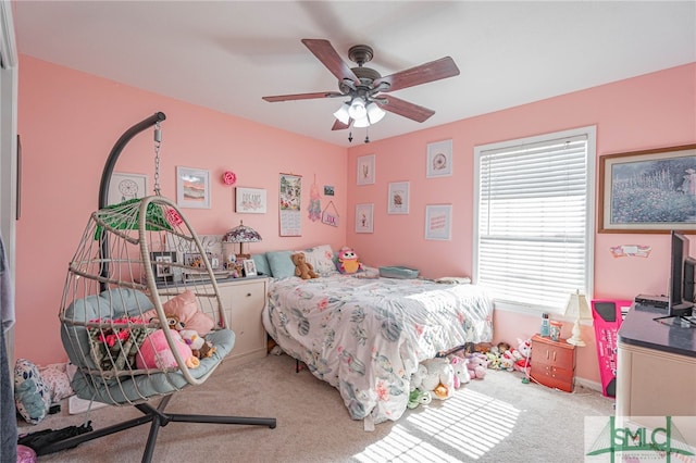 bedroom featuring carpet and a ceiling fan