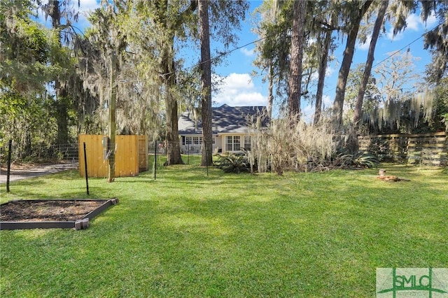 view of yard featuring fence