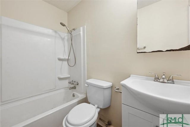 full bath with shower / bathtub combination, toilet, vanity, and a textured ceiling