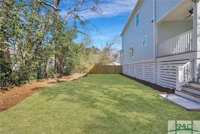 view of yard with fence