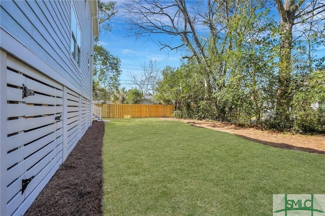 view of yard featuring fence