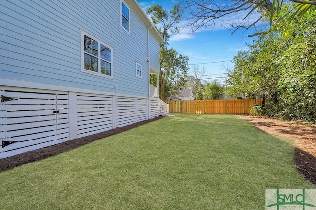 view of yard featuring fence