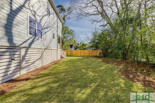 view of yard with fence