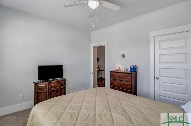 bedroom with carpet, baseboards, and ceiling fan