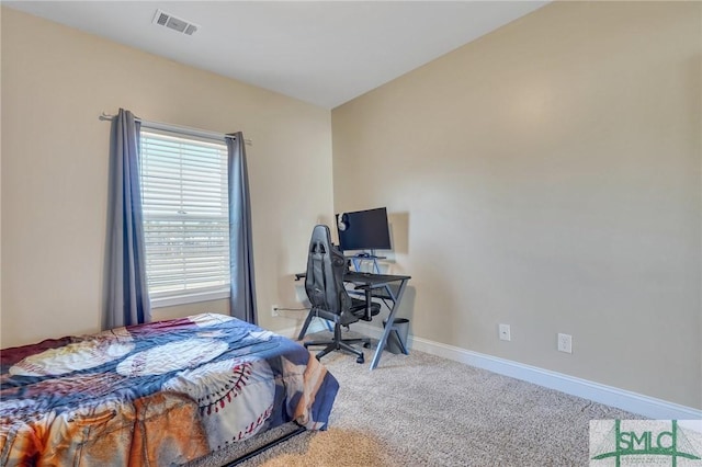 bedroom featuring visible vents, carpet floors, and baseboards