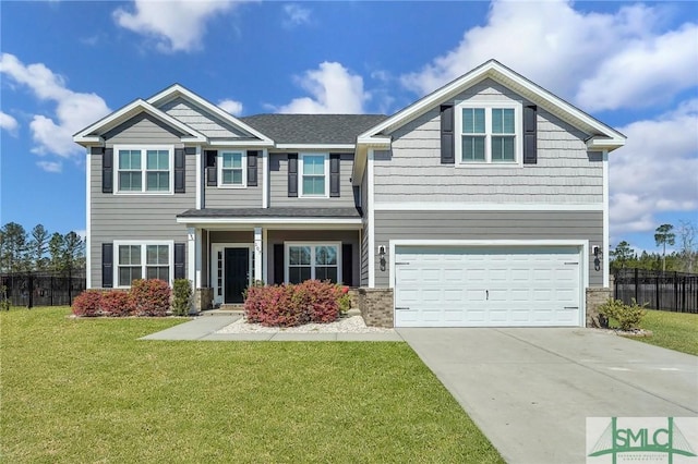 view of front of property featuring a front yard, fence, concrete driveway, a garage, and brick siding