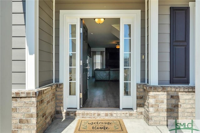 property entrance featuring stone siding