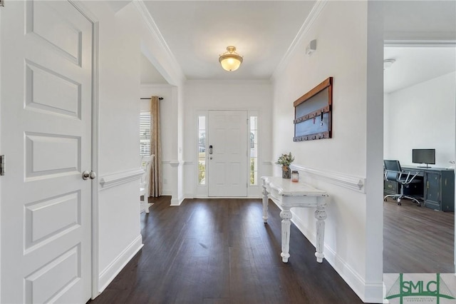 entryway featuring wood finished floors, baseboards, and ornamental molding