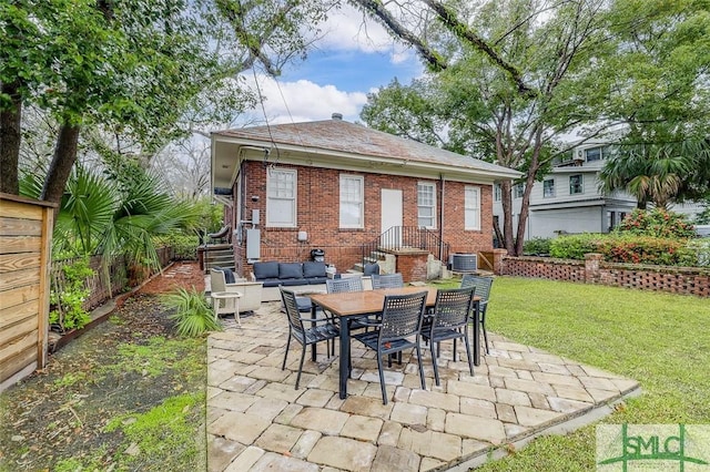 view of patio with an outdoor living space, outdoor dining area, and fence