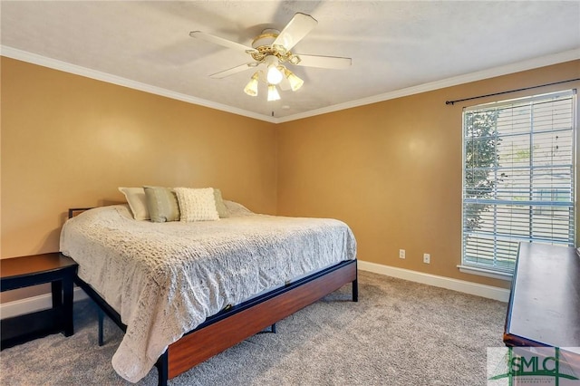 carpeted bedroom with crown molding, a ceiling fan, and baseboards