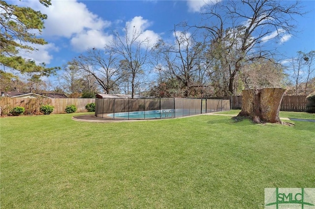 view of yard with a fenced backyard and a fenced in pool