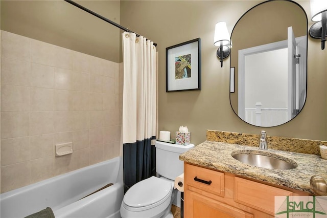 full bath featuring vanity, toilet, and shower / bath combo with shower curtain