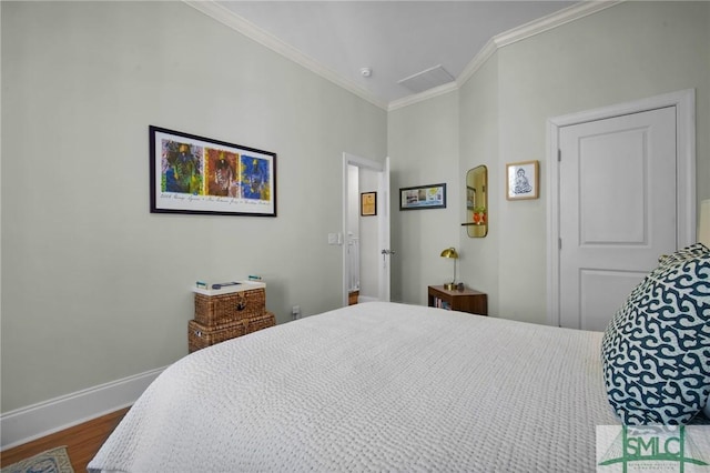 bedroom with baseboards, ornamental molding, and dark wood-style flooring