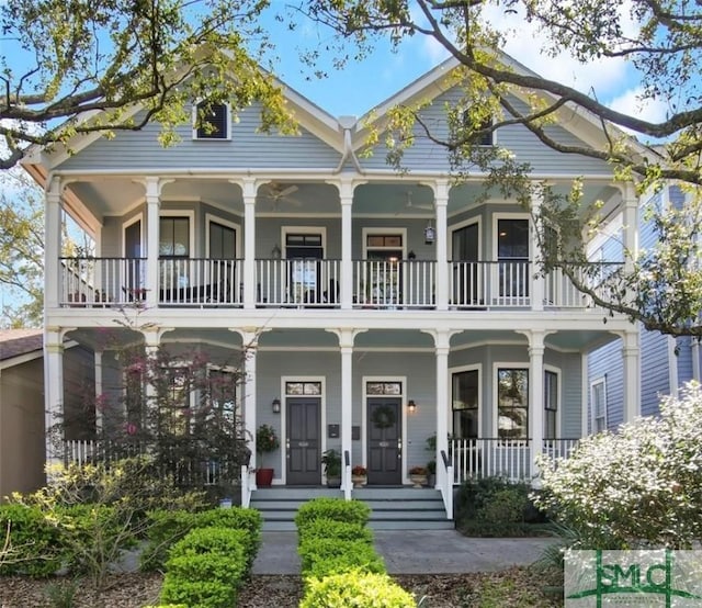 view of front facade with a porch and a balcony