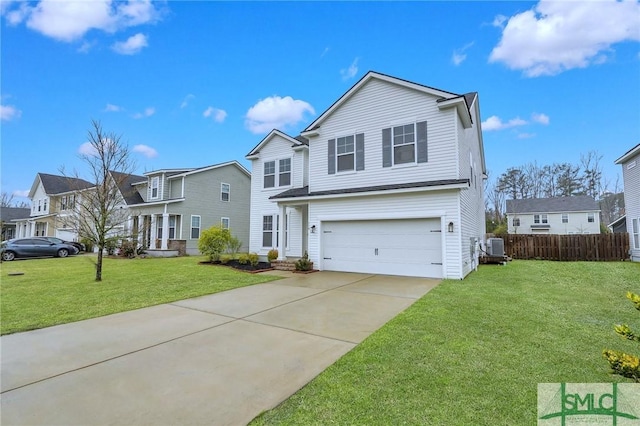 traditional-style house featuring a front lawn, fence, a residential view, driveway, and an attached garage