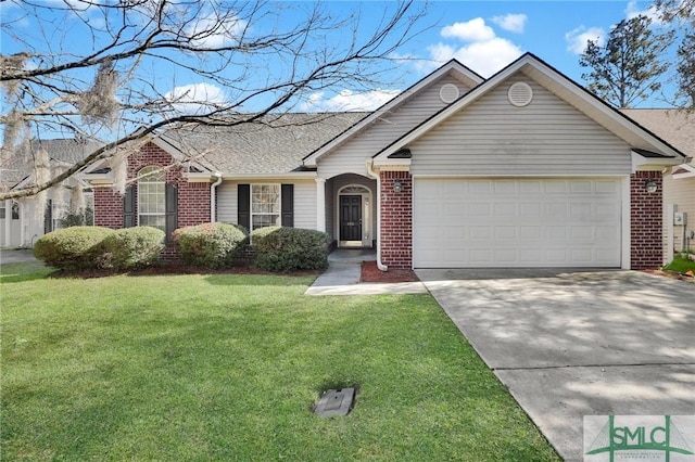 ranch-style house featuring brick siding, a garage, driveway, and a front lawn