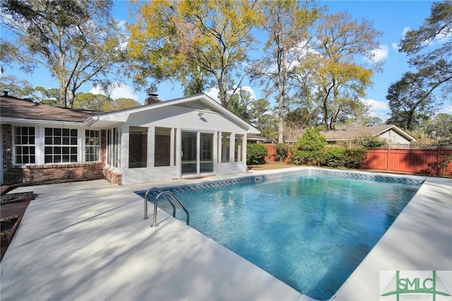 105 Carlton Rd, Savannah, GA 31410 - view of pool featuring a sunroom and a patio area
