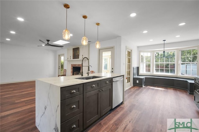 105 Carlton Rd, Savannah, GA 31410 - kitchen with dishwasher, a brick fireplace, dark wood-style floors, recessed lighting, and ceiling fan