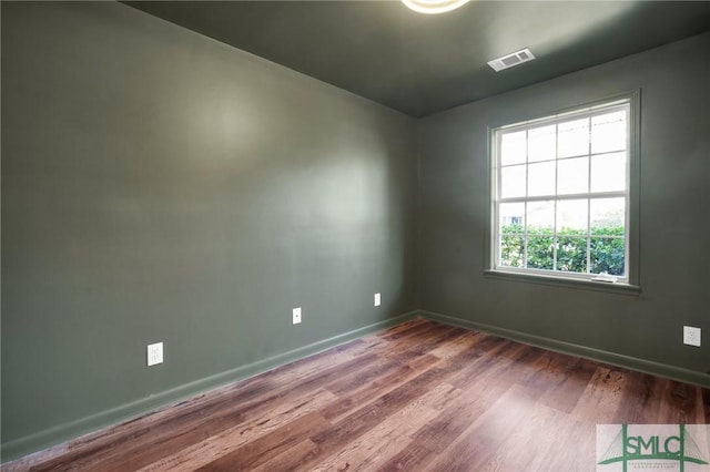 105 Carlton Rd, Savannah, GA 31410 - unfurnished room featuring wood finished floors and baseboards