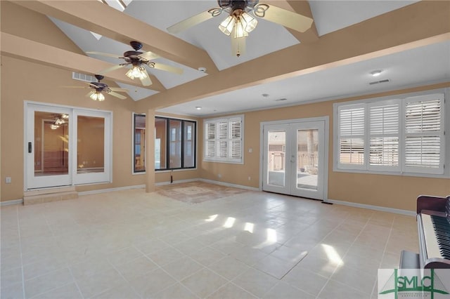 unfurnished living room featuring visible vents, french doors, baseboards, light tile patterned floors, and lofted ceiling