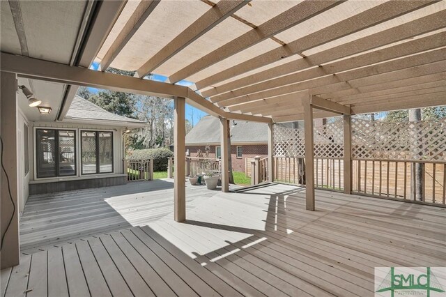 wooden deck with a pergola