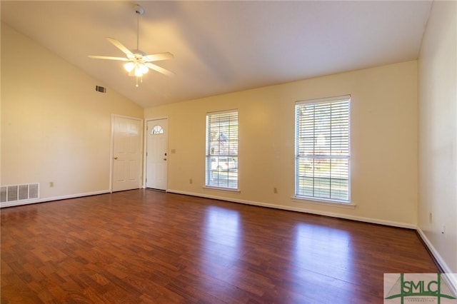 interior space featuring visible vents, baseboards, dark wood-type flooring, and ceiling fan