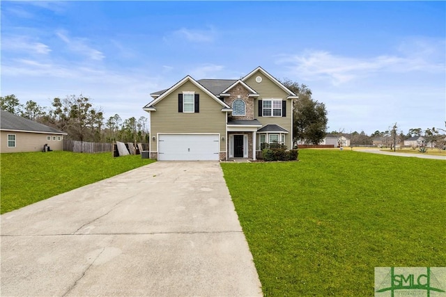 traditional-style home with a garage, driveway, a front lawn, and fence