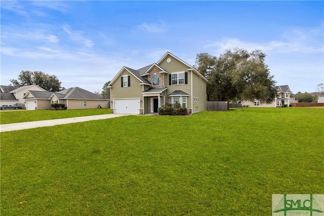 view of front of house with a front yard, concrete driveway, an attached garage, and fence