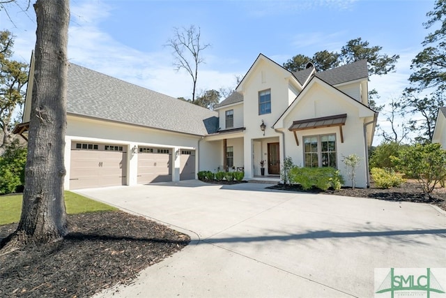 modern inspired farmhouse featuring driveway, roof with shingles, and an attached garage