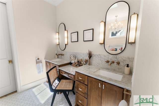 bathroom with tile patterned flooring, backsplash, and vanity