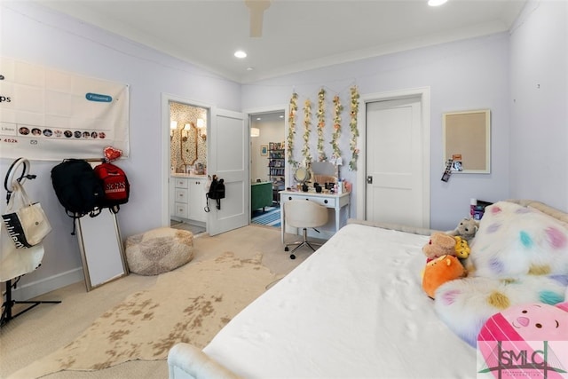 carpeted bedroom with a ceiling fan, connected bathroom, recessed lighting, and ornamental molding