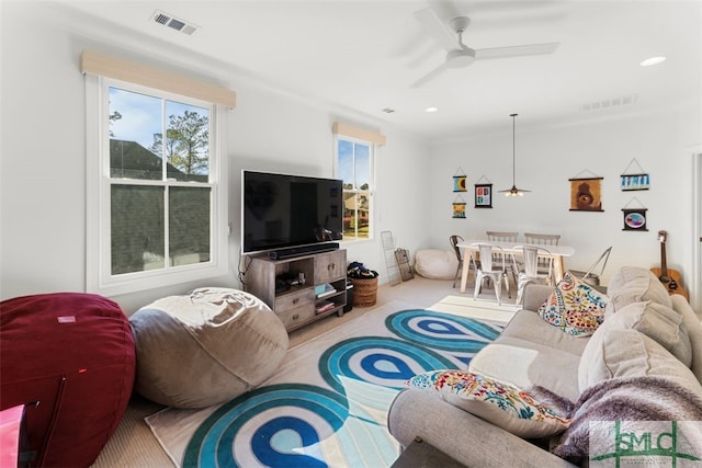 living room with recessed lighting, visible vents, and ceiling fan