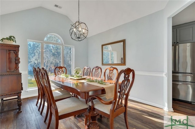 dining room featuring visible vents, baseboards, vaulted ceiling, an inviting chandelier, and dark wood-style floors