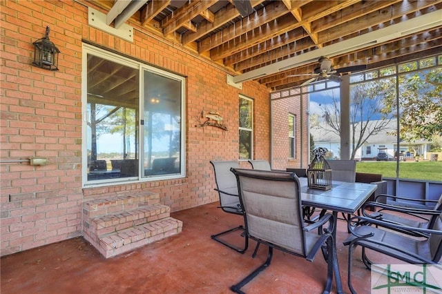 sunroom / solarium with ceiling fan