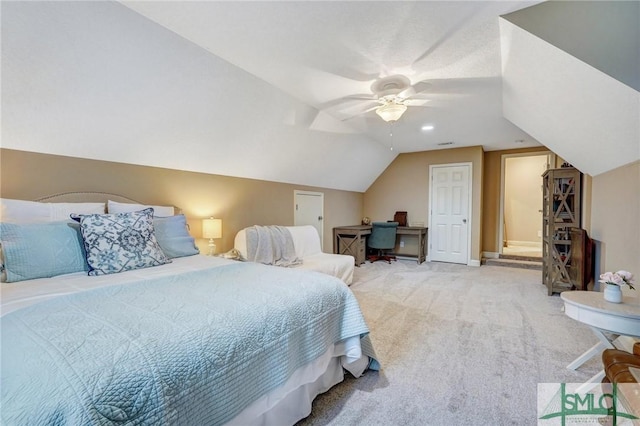 carpeted bedroom with baseboards, a ceiling fan, and lofted ceiling